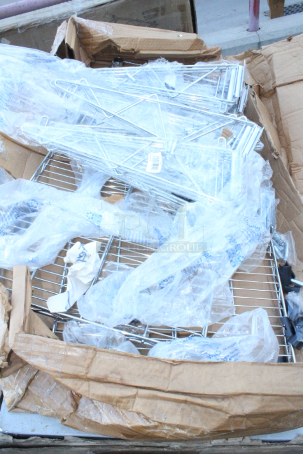 BRAND NEW SCRATCH & DENT! Regency 14" x 60" Chrome Wire Wall Mount Shelf W/ Mounting Bracket Kits. Packaging is damaged. (2) Wire Shelf, (6) Mounting Kits. Some small pieces may be missing.   - Image 2 of 4