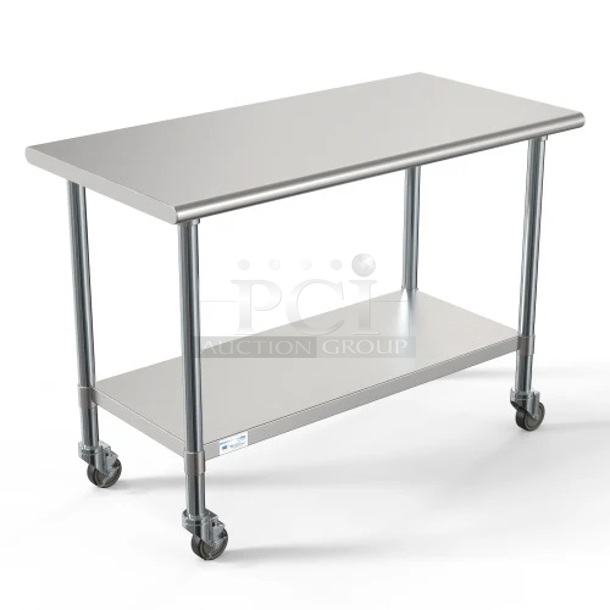 BRAND NEW SCRATCH AND DENT! Koolmore CT2448-18C 24" X 48" 18-Gauge 304 Stainless Steel Commercial Work Table With Casters. IN THE BOX!  - Image 1 of 2