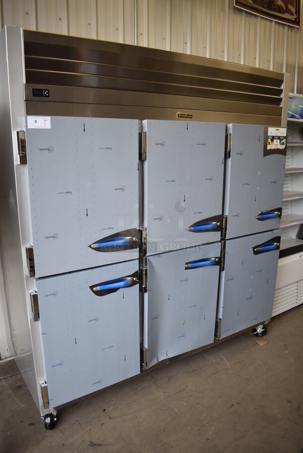 BRAND NEW SCRATCH AND DENT! Traulsen G31003 Stainless Steel Commercial 6 Half Size Reach In Door Freezer w/ Poly Coated Racks on Commercial Casters. 115 Volts, 1 Phase. 76x34x83. Tested and Working!