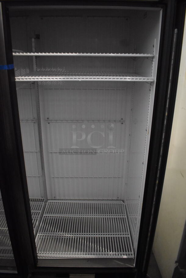 2014 True GDM-72F-LD Commercial Free Standing Electric Powered Triple Swing Glass Door Merchandiser Freezer In Black With Polycoated Racks. 115V/1 Phase Could Not Test Due To Different Plug Style - Image 7 of 8
