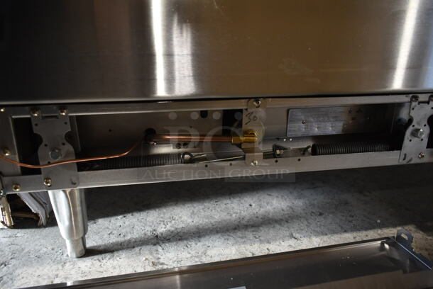 BRAND NEW SCRATCH AND DENT! 2023 Garland G60-4G36RR Stainless Steel Commercial Natural Gas Powered 4 Burner Range w/ Flat Top Griddle, 2 Ovens, Back Splash and Over Shelf. Stock Picture Used as Gallery. - Image 7 of 10