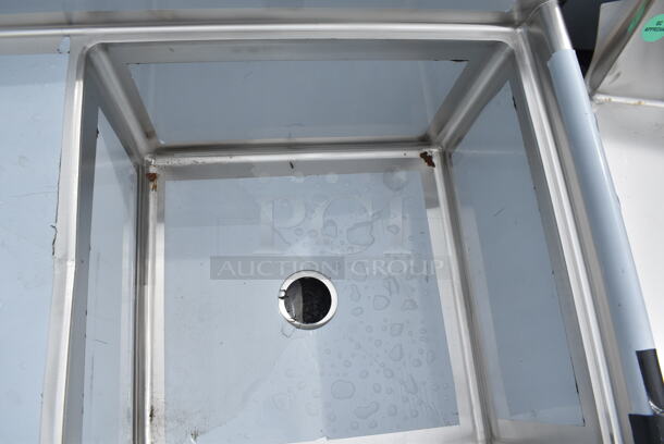 BRAND NEW SCRATCH AND DENT! Regency 600S1242424L 50 1/2" 16 Gauge Stainless Steel One Compartment Commercial Sink with Stainless Steel Legs, Cross Bracing, and 1 Drainboard - 24" x 24" x 14" Bowl. No Legs.  - Image 4 of 6