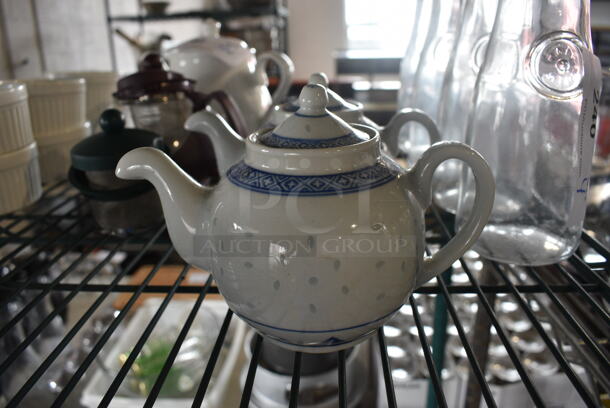 3 White and Blue Ceramic Tea Pots. 7.5x4x5. 3 Times Your Bid!