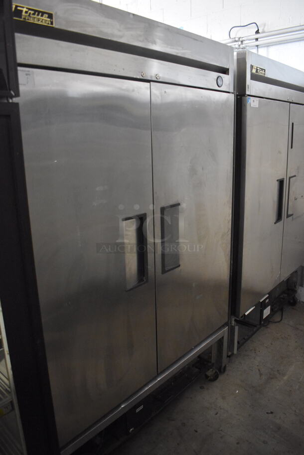 True T-49F Commercial Stainless Steel Reach In Electric Powered Freezer With Polycoated Racks on Commercial Casters. 115V/ 1 Phase. Tested And Working