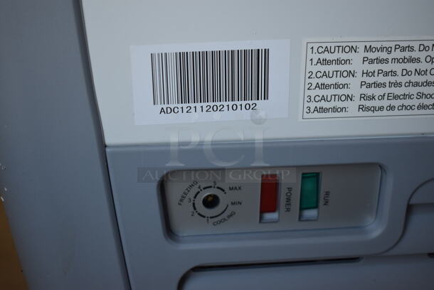 BRAND NEW SCRATCH AND DENT! Avantco 360ADC12HC Metal Commercial Chest Freezer Merchandiser on Commercial Casters. 115 Volts, 1 Phase. 71x28x34. Tested and Working! - Image 9 of 10