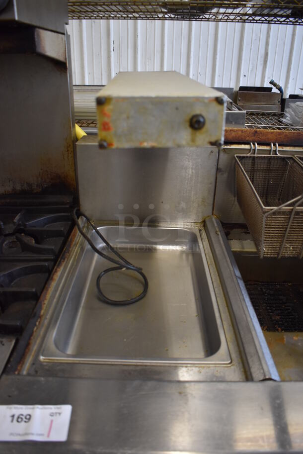 Imperial IFSCB250T Stainless Steel Commercial Natural Gas Powered 2 Bay Deep Fat Fryer w/ Left Side Dumping Station and 4 Metal Fry Baskets on Commercial Casters. 280,000 BTU. 46.5x33.5x51.5 - Image 4 of 12