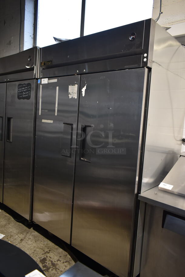 2014 True TG2R-2S ENERGY STAR Stainless Steel Commercial 2 Door Reach In Cooler w/ Poly Coated Racks on Commercial Casters. 115 Volts, 1 Phase. Tested and Working!