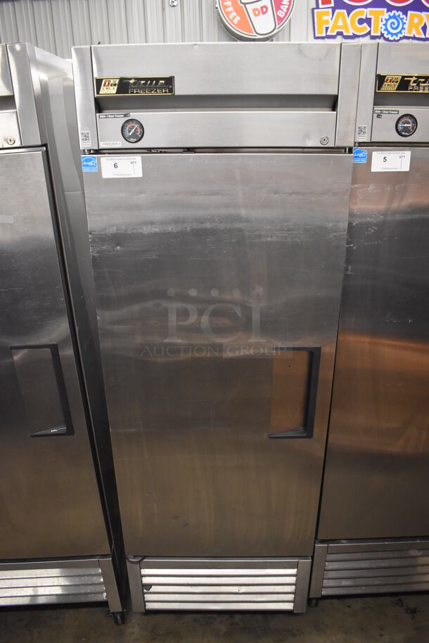 2013 True T-23F ENERGY STAR Stainless Steel Commercial Single Door Reach In Freezer w/ Poly Coated Racks on Commercial Casters. 115 Volts, 1 Phase. 27x30x83.5. Tested and Working!