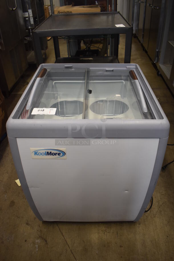KoolMore KM-ICD-26SD Metal Commercial Chest Freezer Merchandiser on Commercial Casters. 115 Volts, 1 Phase. 26x28x34. Tested and Powers On But Temps at 46 Degrees