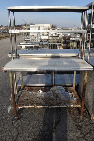 Stainless Steel Table w/ 2 Over Shelves and Metal Under Shelf. 48x30x68