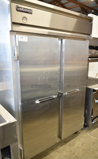 2021 Continental 2F Stainless Steel Commercial 2 Door Reach In Freezer w/ Poly Coated Racks on Commercial Casters. 115 Volts, 1 Phase. Tested and Does Not Power On. Appears to Need to be Rewired and a New Power Cord