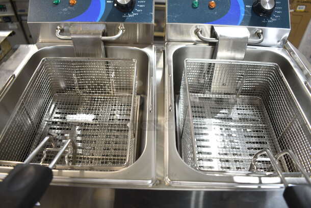 BRAND NEW SCRATCH AND DENT! 2023 Hoocoo FRY-20L Stainless Steel Commercial Countertop Electric Powered 2 Bay Deep Fat Fryer w/ 2 Metal Baskets and 2 Lids. 120 Volts, 1 Phase.
 - Image 5 of 9