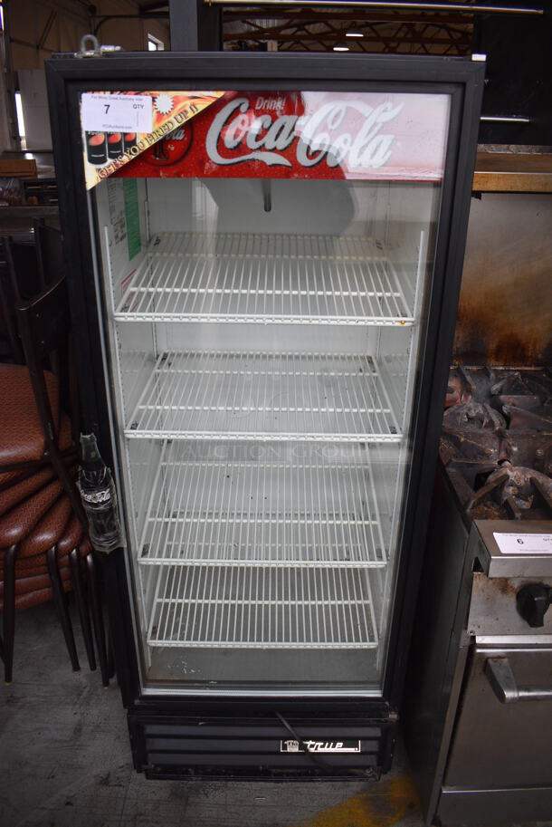 True Model GDM-12 Metal Commercial Single Door Reach In Cooler Merchandiser w/ Poly Coated Racks. 115 Volts, 1 Phase. 25x25x62.5. Tested and Powers On But Temps at 50 Degrees