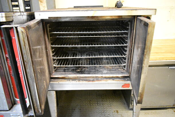 Blodgett Stainless Steel Commercial Electric Powered Full Size Convection Oven w/ Solid Doors, Metal Oven Racks and Thermostatic Controls on Metal Legs. 3 Phase. This Unit Was In Working Condition When the Restaurant Closed. (kitchen) - Image 2 of 9