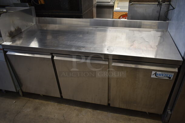 Avantco 178SSWT72RHC Stainless Steel Commercial 3 Door Work Top Cooler w/ Back Splash on Commercial Casters. 1 Caster Is Broken. 115 Volts, 1 Phase. Tested and Working!