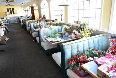 10 Green and Tan Booth Seats; Singles and Doubles. Does Not Include Contents or Tables. 10 Times Your Bid! BUYER MUST REMOVE: Bring Tools and Manpower Needed To Remove This Item. (booth room) 