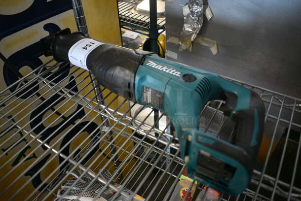 Makita Model XRJ04 Battery Powered Reciprocating Saw. 3x19x7