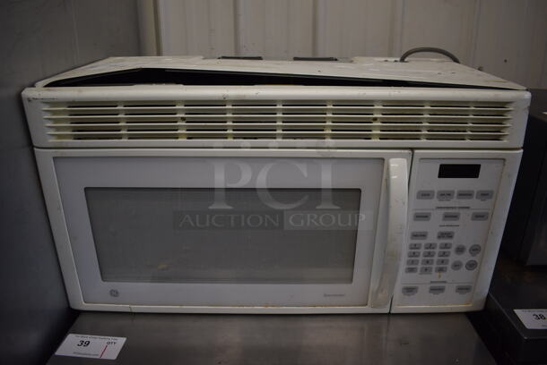 General Electric JVM1440WH04 Metal Microwave Oven w/ Plate. 120 Volts, 1 Phase. 30x16x16