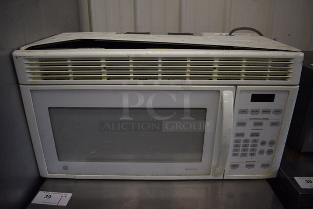 General Electric JVM1440WH04 Metal Microwave Oven w/ Plate. 120 Volts, 1 Phase. 30x16x16 - Image 1 of 6