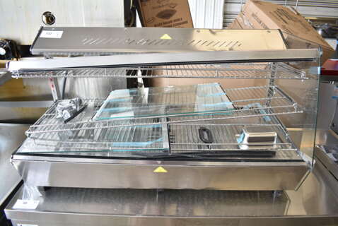 BRAND NEW SCRATCH AND DENT! ServIt 423HDM48SA Stainless Steel 48" Self / Full Service 3 Shelf Countertop Heated Display Case with Sliding Door. See Pictures for Broken Glass. 120 Volts, 1 Phase. Tested and Powers On But Does Not Get Warm