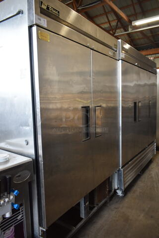 True T-49 Stainless Steel Commercial 2 Door Reach In Cooler w/ Poly Coated Racks on Commercial Casters. 115 Volts, 1 Phase. Cannot Test Due To Cut Power Cord