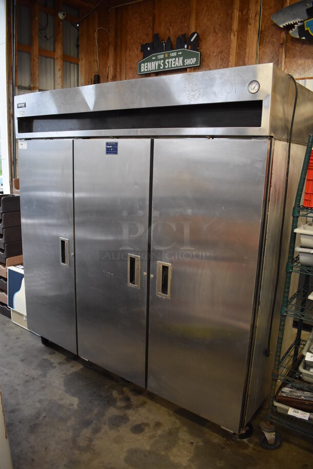 Delfield 6176-S Stainless Steel Commercial 3 Door Reach In Cooler on Commercial Casters. 115 Volts, 1 Phase. 76x32.5x80. Tested and Does Not Power On