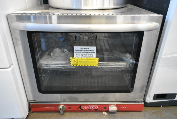 BRAND NEW SCRATCH AND DENT! Avantco 177CO28M Stainless Steel Commercial Countertop Electric Powered Half Size Convection Oven. 208/240 Volts, 1 Phase.  - Image 1 of 6