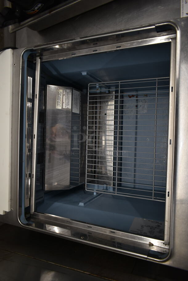 2014 Delfield 4427N-12M Stainless Steel Commercial Prep Table on Commercial Casters. 115 Volts, 1 Phase. Tested and Powers On But Does Not Get Cold
 - Image 2 of 5