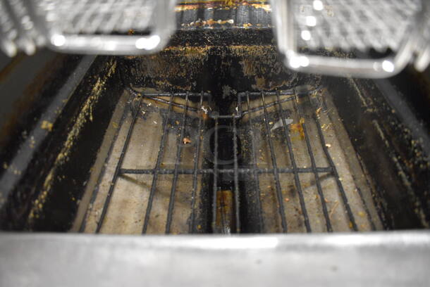 2010 Frymaster Model BIGLA330CSD Stainless Steel Commercial Floor Style Natural Gas Powered 3 Bay Deep Fat Fryer w/ 6 NEW Metal Fry Baskets and 2 Lids on Commercial Casters. 75,000 BTU. 48x33x48.5 - Image 4 of 11