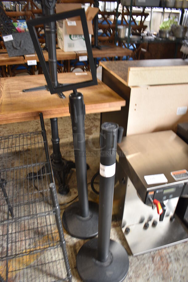 2 Black Stanchions. 12x12x50.5, 12x12x37.5. 2 Times Your Bid!