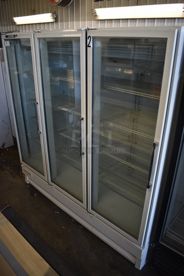 Carrier Refrigeration Pulse Model ULG808CEXT-5 Metal Commercial 3 Glass Door Reach In Cooler Merchandiser w/ Poly Coated Racks. 115/208-230 Volts, 1 Phase. 78x36x79.5.