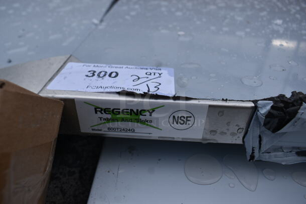BRAND NEW SCRATCH AND DENT! Regency 600TSB3072S 30" x 72" 16-Gauge Stainless Steel Commercial Work Table with 4" Backsplash and Undershelf - Image 6 of 6