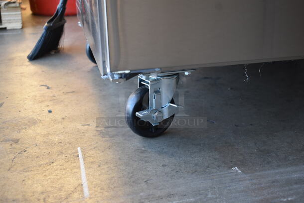 BRAND NEW SCRATCH AND DENT! 2023 KoolMore FWT-2D-12C Stainless Steel Commercial 2 Door Work Top Freezer w/ Back Splash on Commercial Casters. 115 Volts, 1 Phase. Tested and Working! - Image 5 of 8