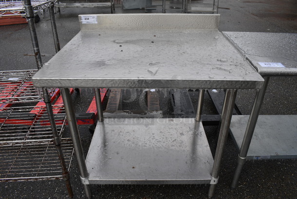 Stainless Steel Commercial Table w/ Back Splash and Stainless Steel Under Shelf. 36x30x38