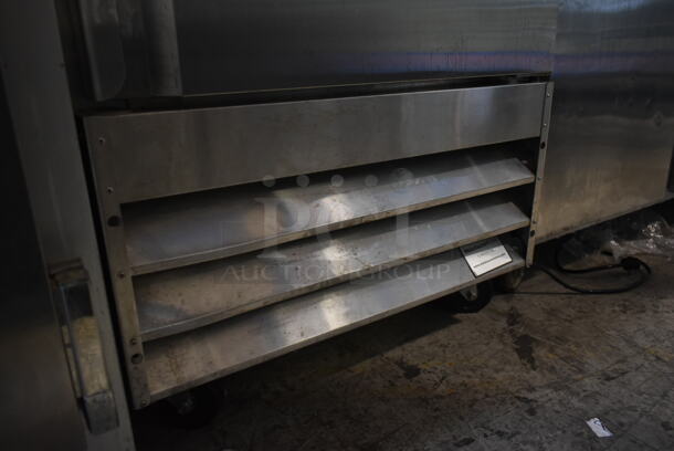 Avantco 178CFD1RR Stainless Steel Commercial Single Door Reach In Freezer w/ Poly Coated Racks on Commercial Casters. 115 Volts, 1 Phase. Tested and Powers On But Does Not Get Cold - Image 4 of 7