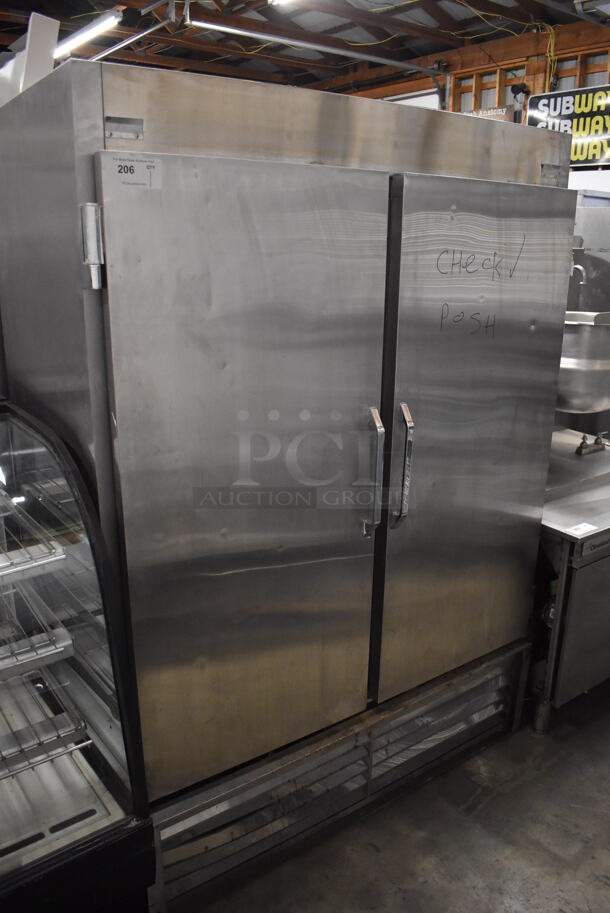 2012 Leader ESLR54 S/C Stainless Steel Commercial 2 Door Reach In Cooler. 115 Volts, 1 Phase. 54x32x76. Tested and Working!