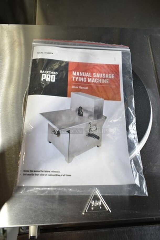 BRAND NEW SCRATCH AND DENT! Backyard Pro 554BMSTM Stainless Steel Commercial Countertop 18 1/2" x 11 3/8" x 13 3/8" Manual Sausage Tying Machine.  - Image 6 of 7