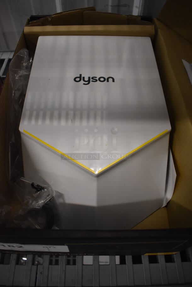 BRAND NEW IN BOX! Dyson HU02 Airblade V 307173-01 White ADA Compliant Hand Dryer. 120 Volts, 1 Phase. 9x15x5. Tested and Working!
