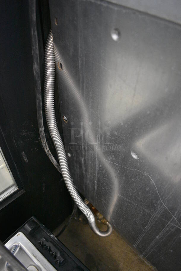 Wolf Stainless Steel Commercial Natural Gas Powered 4 Burner Range w/ Flat Top, Charbroiler, Convection Oven, Warmer, Over Shelf and Back Splash. 48x28x57 - Image 11 of 11