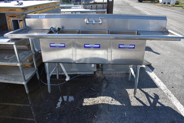 Stainless Steel Commercial 3 Bay Sink w/ Dual Drain Boards, Faucet, Handles and Spray Nozzle Attachment. 90x27x45. Bays 18x21x14. Drain Boards 16x23x1