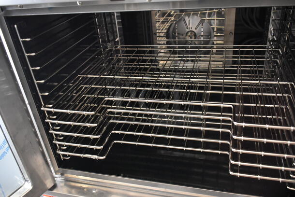 BRAND NEW SCRATCH AND DENT! Vulcan VC4ED Stainless Steel Commercial Electric Powered Full Size Convection Oven w/ View Through Doors, Metal Oven Racks and Thermostatic Controls on Metal Legs. See Pictures for Smaller Legs Than The Gallery Shows. 480 Volts, 1/3 Phase.  - Image 6 of 8