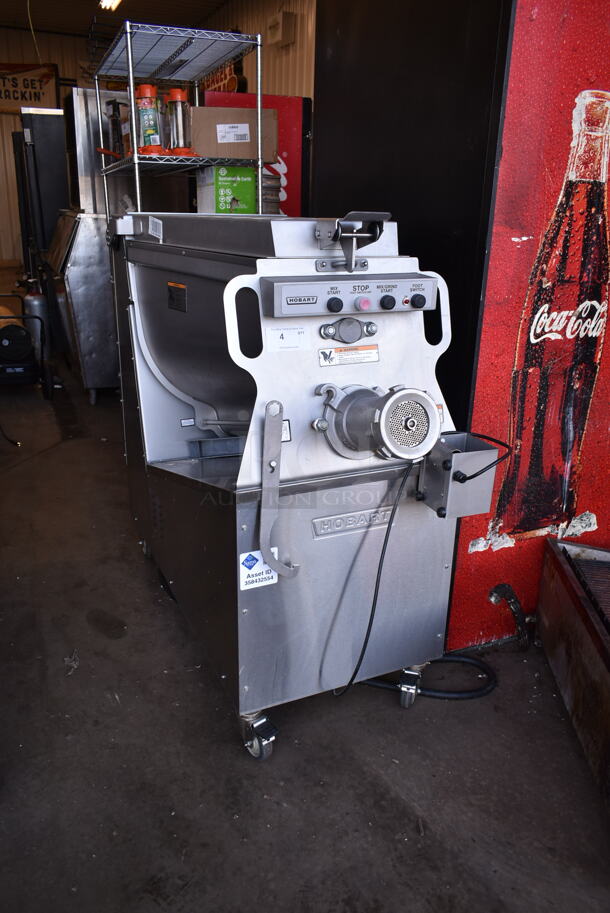2021 Hobart MG2032 Metal Commercial Floor Style Electric Powered Meat Grinder w/ Foot Pedal on Commercial Casters. 208 Volts, 3 Phase.