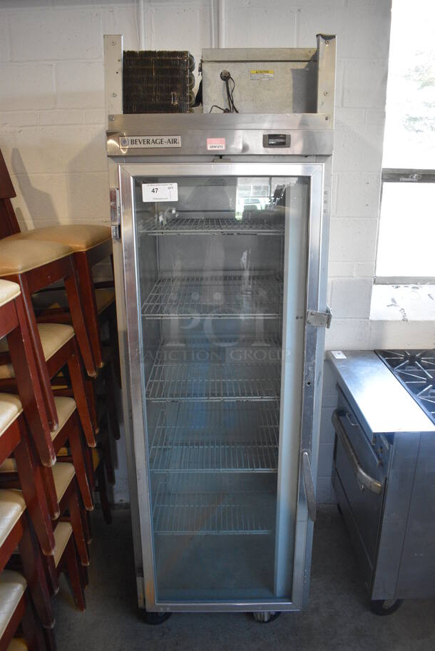 Beverage Air Model HR1-1G Stainless Steel Commercial Single Door Reach In Cooler Merchandiser w/ Poly Coated Racks on Commercial Casters. 115 Volts, 1 Phase. 26x34x84. Tested and Powers On But Temps at 50 Degrees - Image 1 of 6