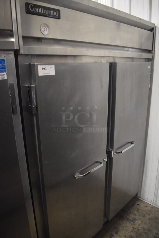 Continental 2RE-SS Stainless Steel Commercial 2 Door Reach In Cooler on Commercial Casters. 115 Volts, 1 Phase. 57x34x82. Tested and Powers On But Does Not Get Cold