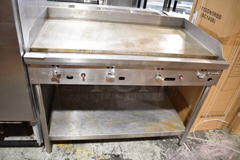 Jade Stainless Steel Commercial Natural Gas Powered Flat Top Griddle w/ Under Shelf. 
