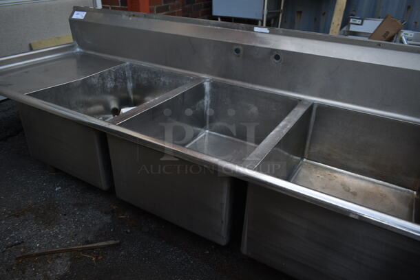Stainless Steel Commercial 3 Bay Sink w/ Dual Drain Boards, Handles, Faucet and Spray Nozzle Attachment. No Legs. Bays 20x28. Drain Boards 18.5x20 - Image 6 of 6
