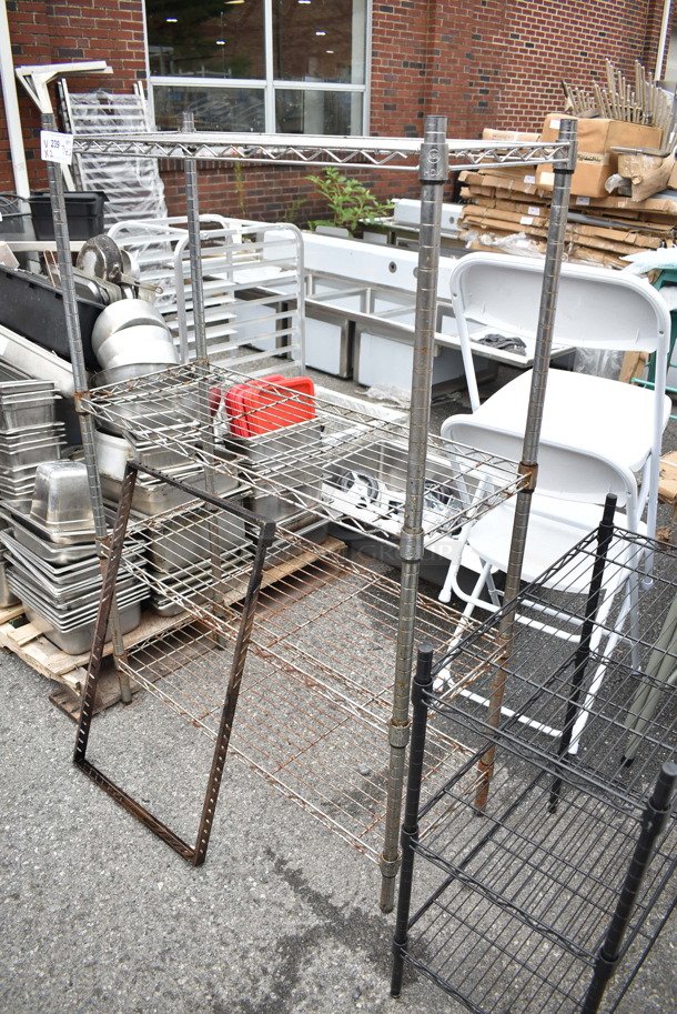 2 Wire Shelving Units; Chrome Finish 4 Tier and Black 3 Tier. 23x13x31, 36x14x54.5. 2 Times Your Bid! BUYER MUST DISMANTLE. PCI CANNOT DISMANTLE FOR SHIPPING. PLEASE CONSIDER FREIGHT CHARGES. - Image 4 of 6