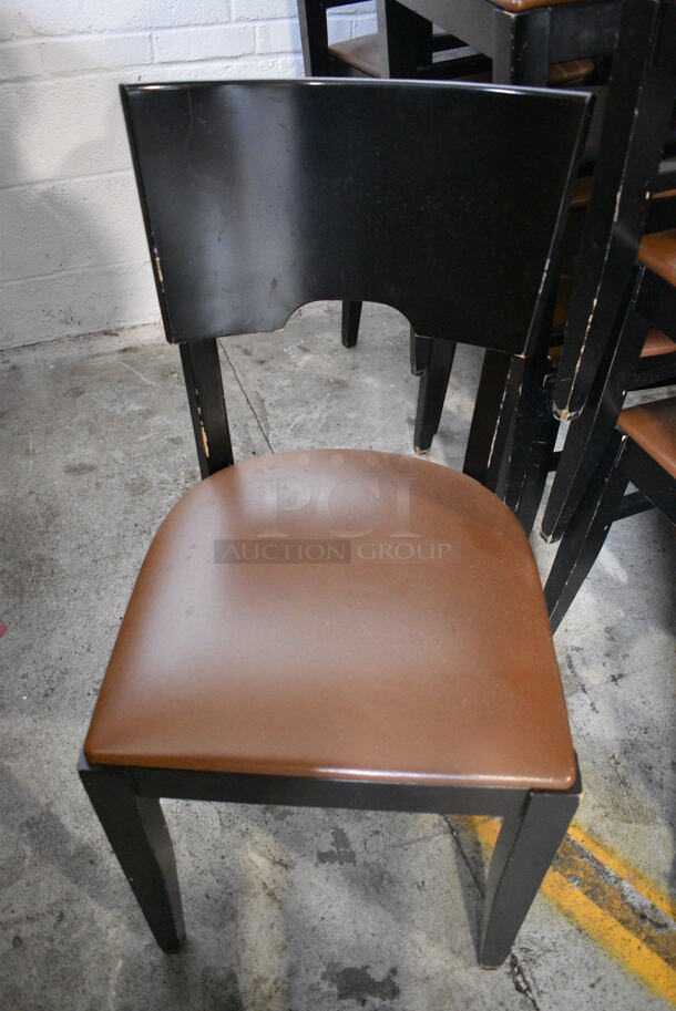 6 Black Wood Pattern Dining Chairs w/ Brown Seat Cushion. 16x16x32.5. 6 Times Your Bid!