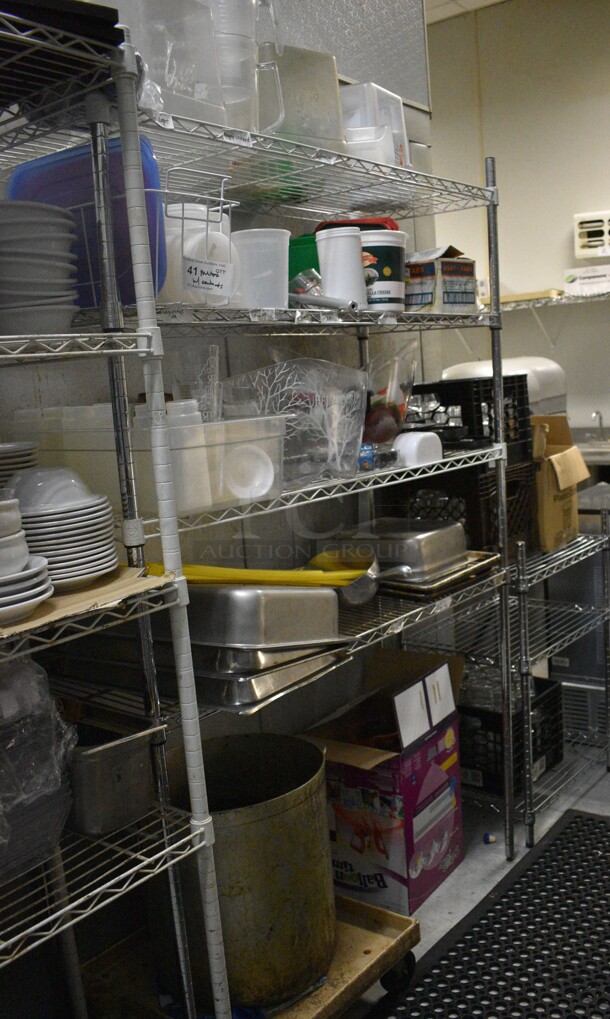 Chrome Finish 4 Tier Shelving Unit w/ Contents Including Poly Containers, Stainless Steel Bins and Stock Pot. 48x18x74. BUYER MUST REMOVE. BUYER MUST DISMANTLE. PCI CANNOT DISMANTLE FOR SHIPPING. PLEASE CONSIDER FREIGHT CHARGES. (kitchen)