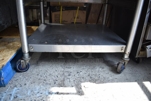 Vulcan VCCG36-CKR1 Stainless Steel Commercial Natural Gas Powered Flat Top Griddle w/ Under Shelf on Commercial Casters. 90,000 BTU.  - Image 3 of 5